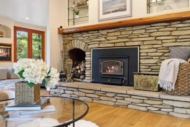 a kitchen with stainless steel appliances a stove sink and cabinets