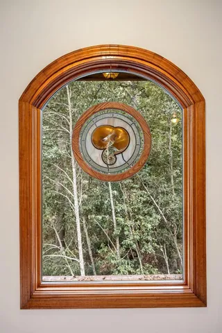 a large kitchen with kitchen island a sink stainless steel appliances and cabinets