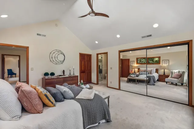 a bathroom with a tub and shower