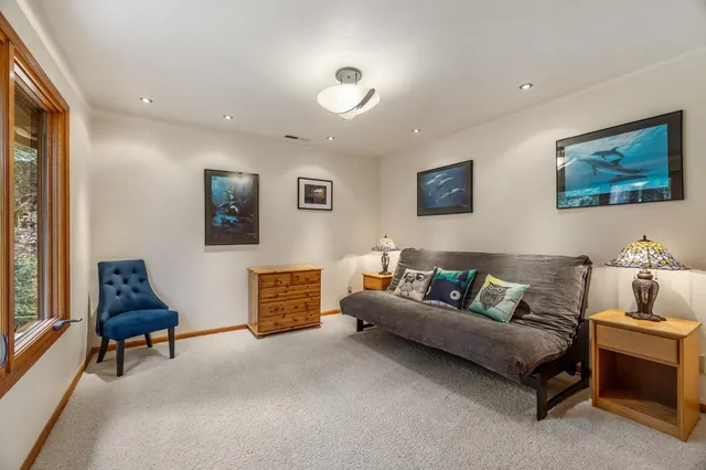 a balcony with wooden floor and wooden floor