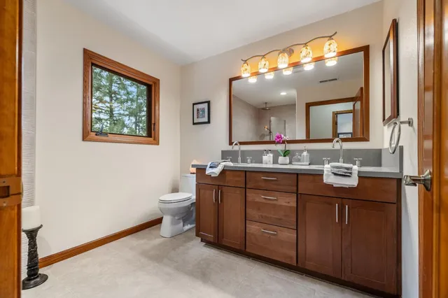a view of a balcony with wooden floor