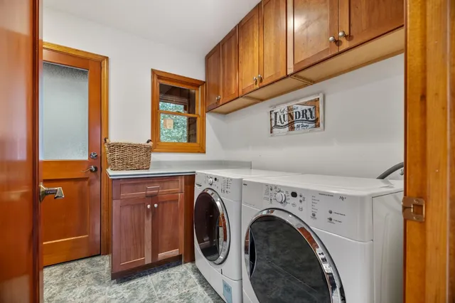 a view of a large yard with lots of trees