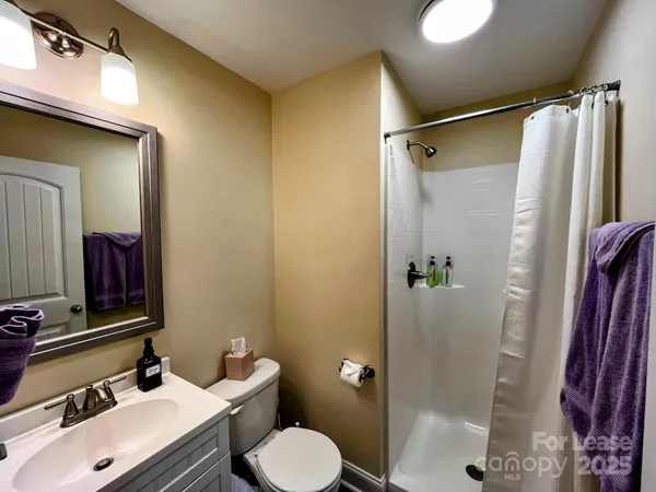 a bathroom with a sink and toilet