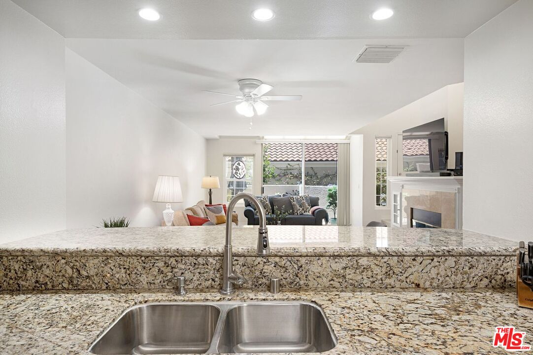 4240 Lost Hills Road, Unit 2602 Calabasas, CA 91301 - Photo 13 of 38 a kitchen with a sink and a window