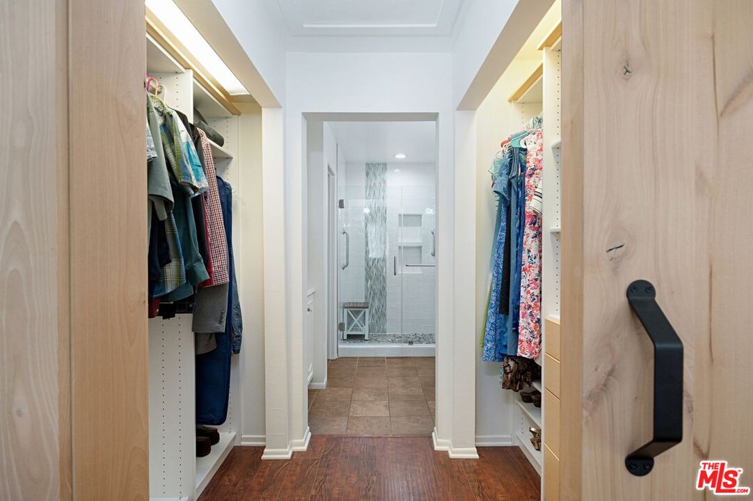 4240 Lost Hills Road, Unit 2602 Calabasas, CA 91301 - Photo 22 of 38 a view of hallway with wooden floor and stairs