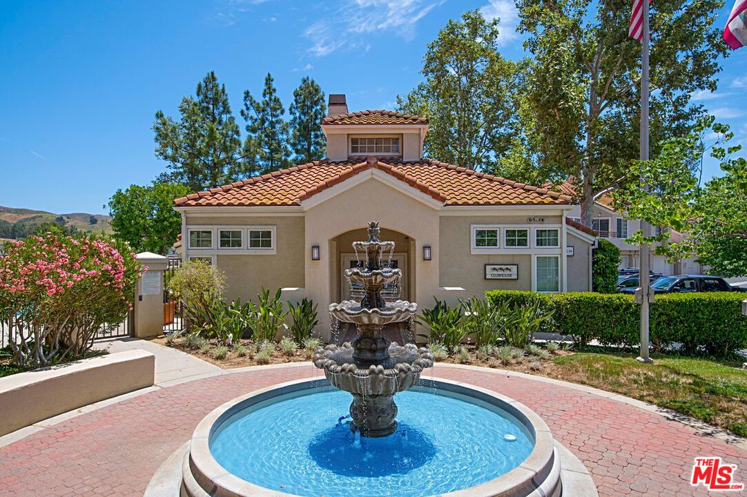 4240 Lost Hills Road, Unit 2602 Calabasas, CA 91301 - Photo 37 of 38 a front view of a house with a garden