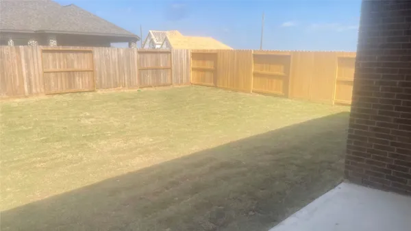 a view of a big room with wooden floor