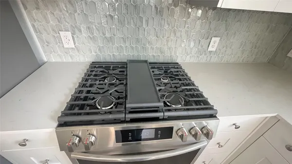 a close view of stove top oven