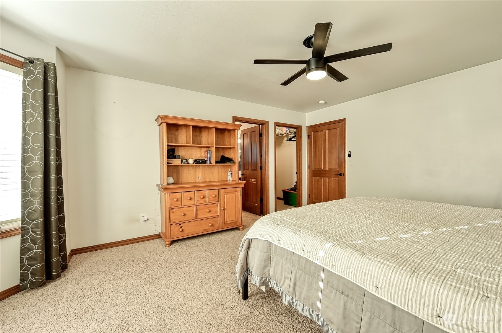 5576 Old Settler Drive Ferndale, WA 98248 - Photo 18 of 20 a bedroom with a bed and ceiling fan