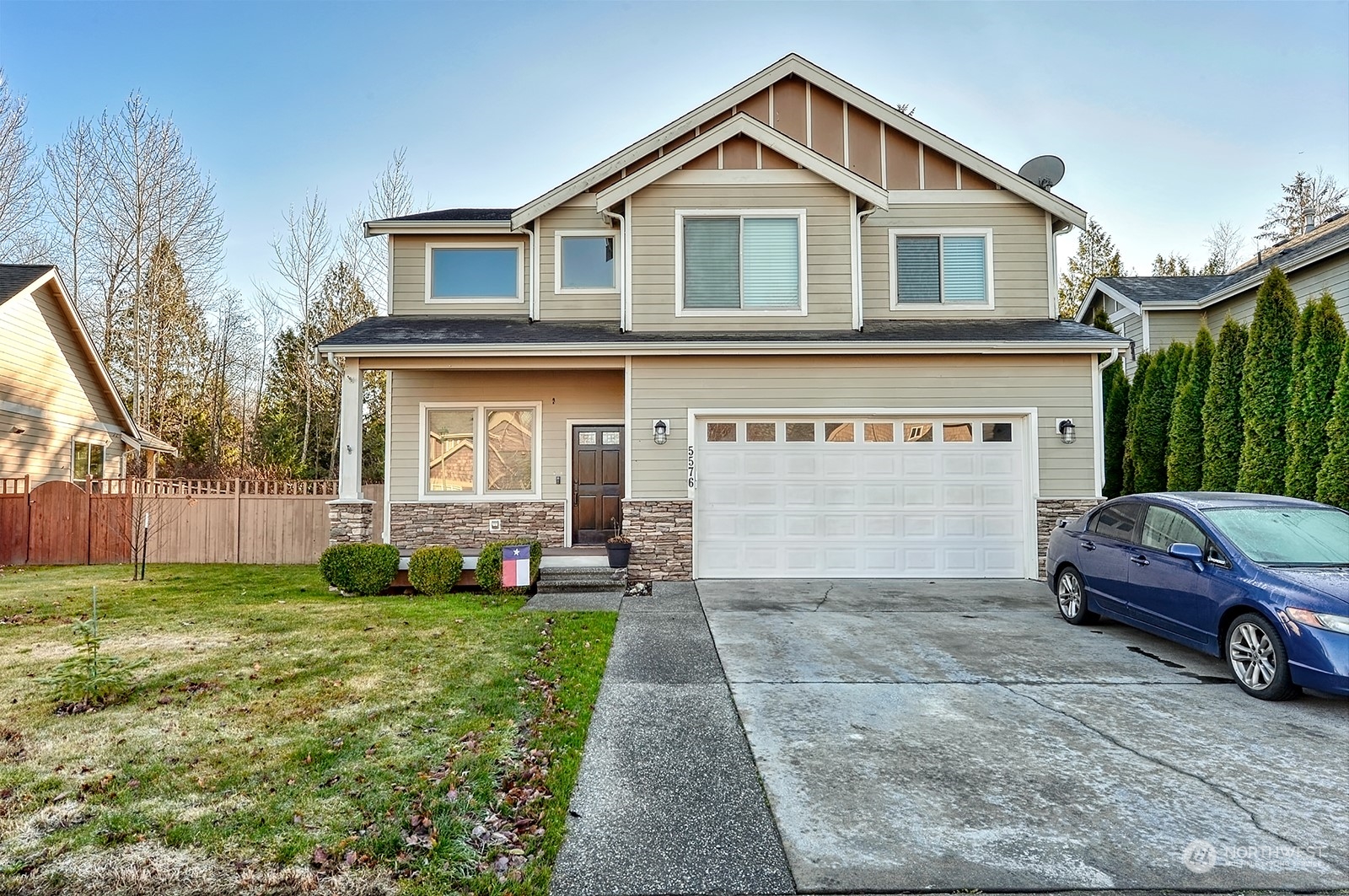 5576 Old Settler Drive Ferndale, WA 98248 - Photo 2 of 20 a front view of a house with a yard