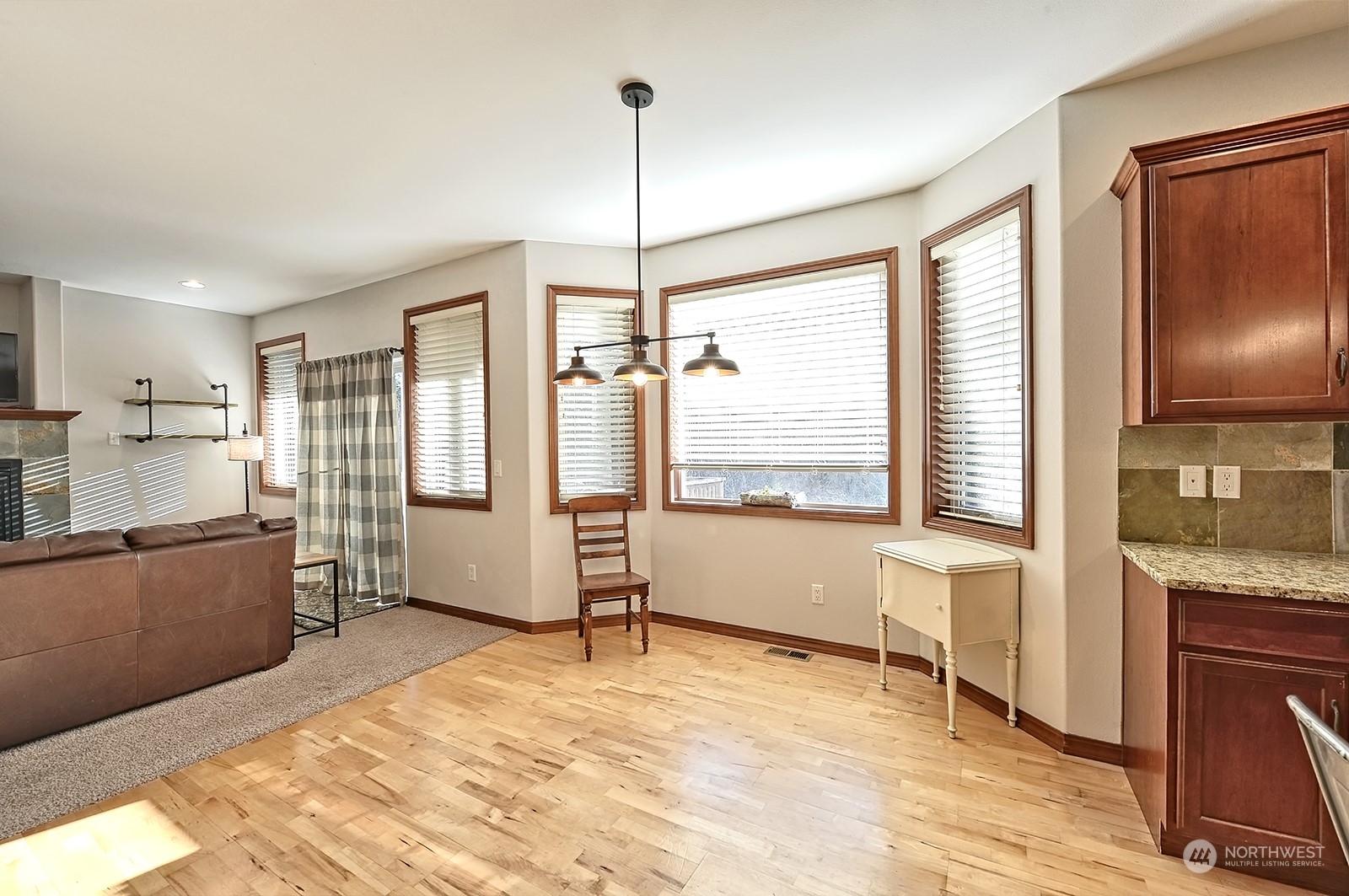 5576 Old Settler Drive Ferndale, WA 98248 - Photo 6 of 20 a kitchen with stainless steel appliances granite countertop a refrigerator and a sink