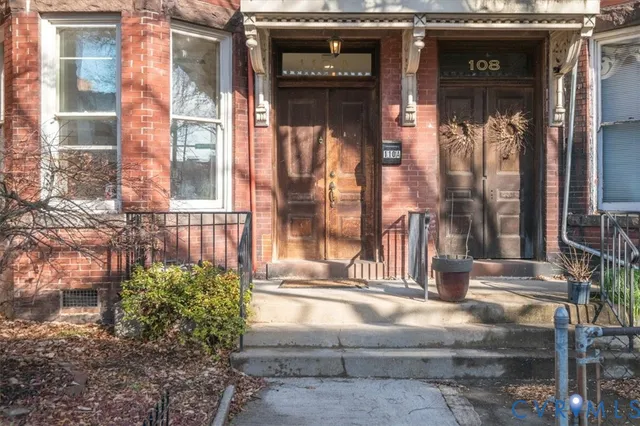 a view of entrance of the house and living room