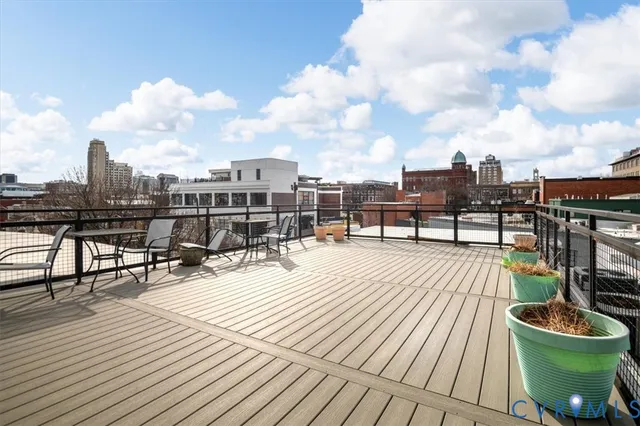 a view of roof deck with patio