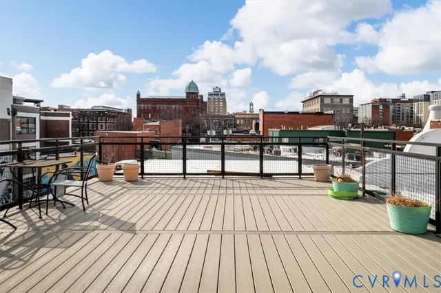 a view of a terrace with furniture