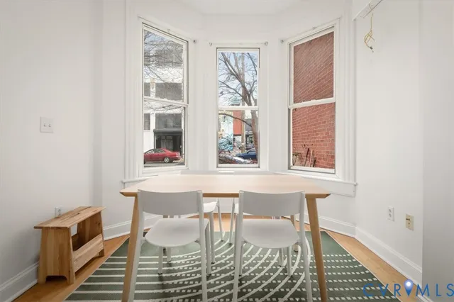 a workspace with furniture and window