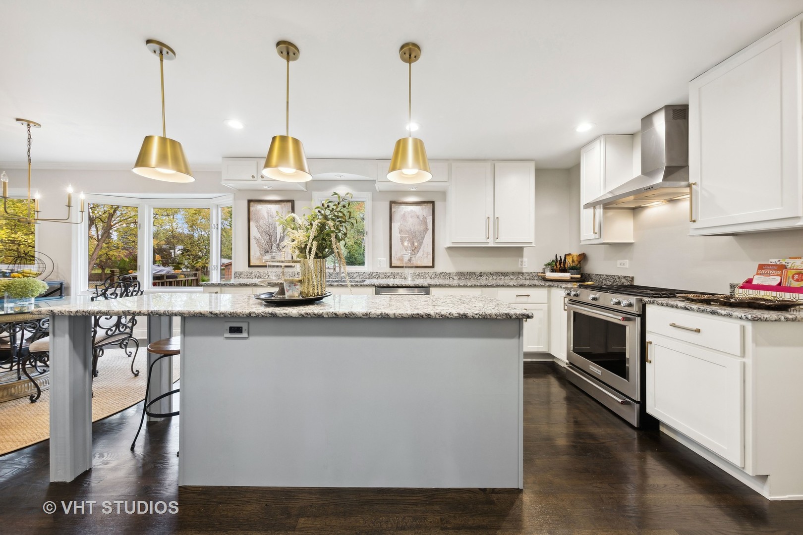 2S540 White Birch Lane Wheaton, IL 60189 - Photo 17 of 46 a kitchen with stainless steel appliances granite countertop a stove a sink and a white refrigerator