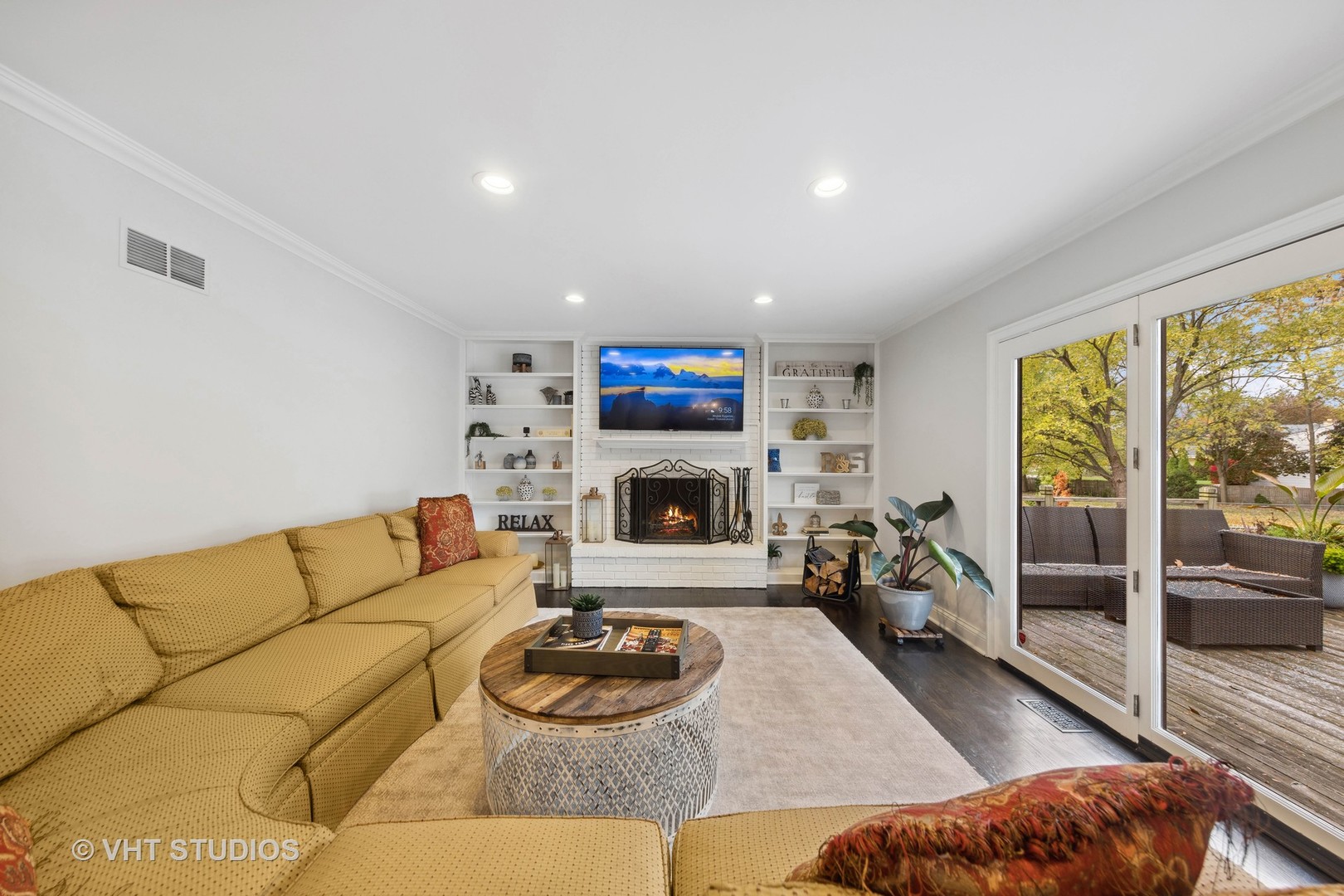 2S540 White Birch Lane Wheaton, IL 60189 - Photo 21 of 46 a living room with furniture and a fireplace