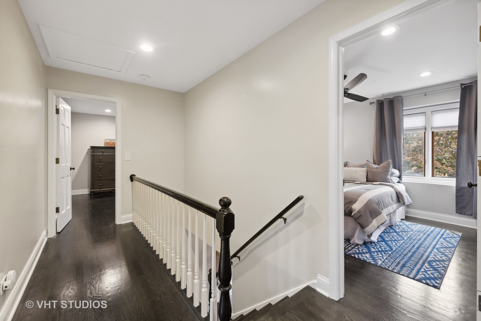 2S540 White Birch Lane Wheaton, IL 60189 - Photo 25 of 46 a hallway with wooden floor and furniture