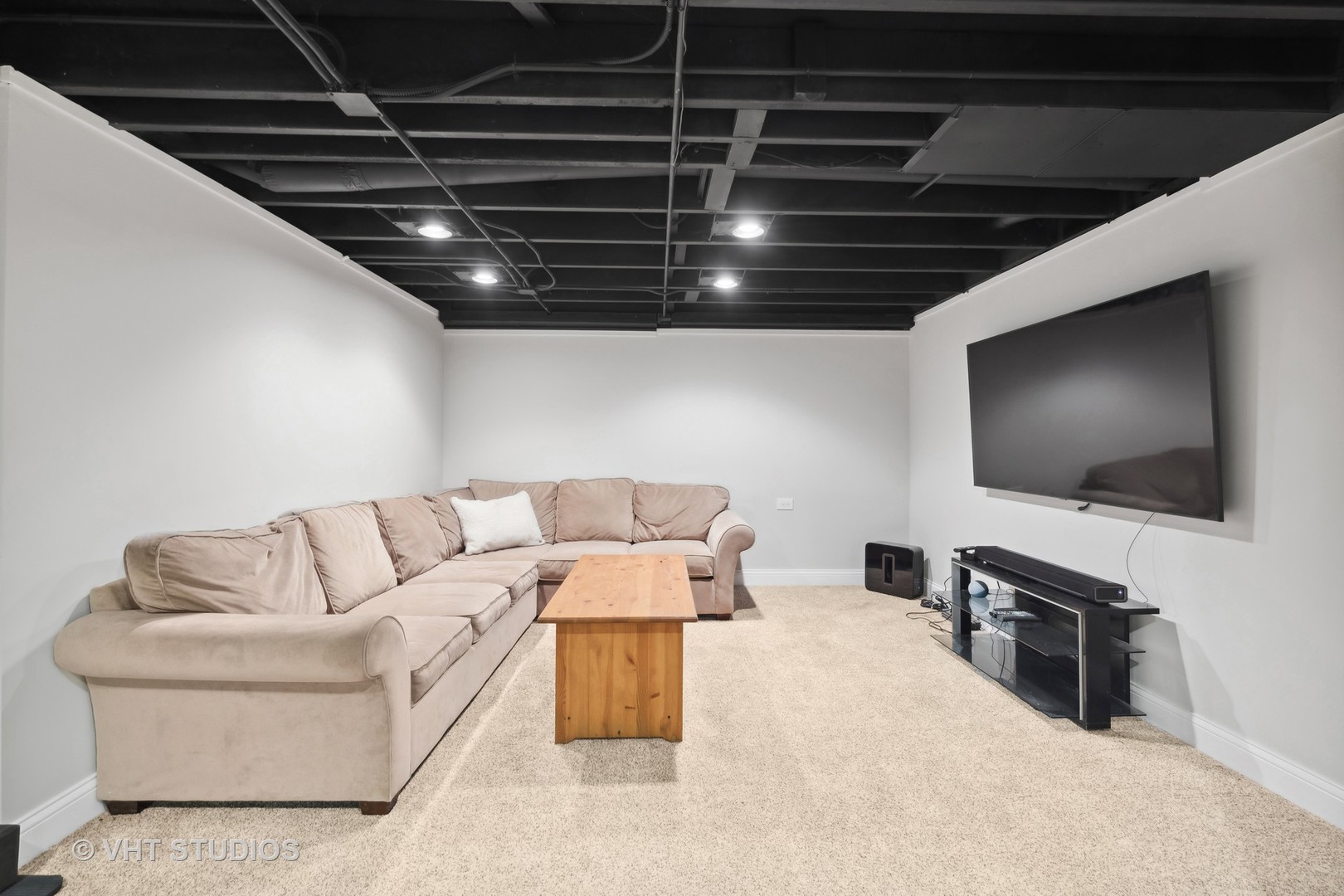 2S540 White Birch Lane Wheaton, IL 60189 - Photo 38 of 46 a living room with furniture and a flat screen tv