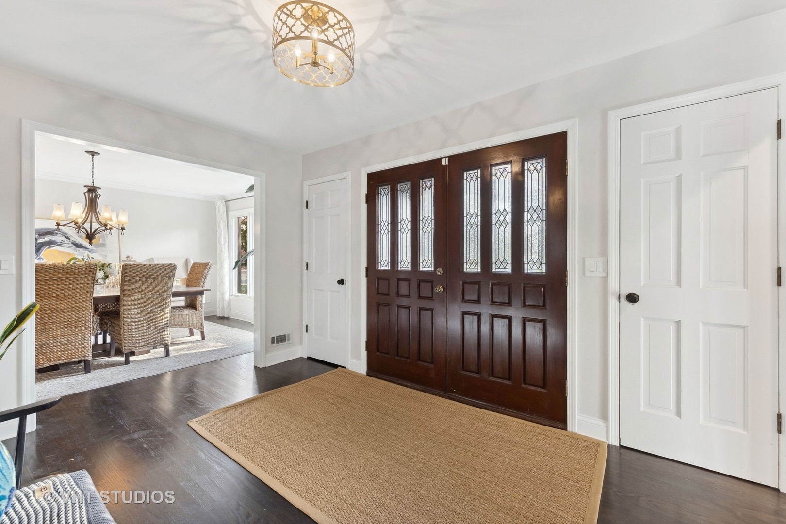 2S540 White Birch Lane Wheaton, IL 60189 - Photo 8 of 46 a bedroom with furniture wooden floor and a chandelier