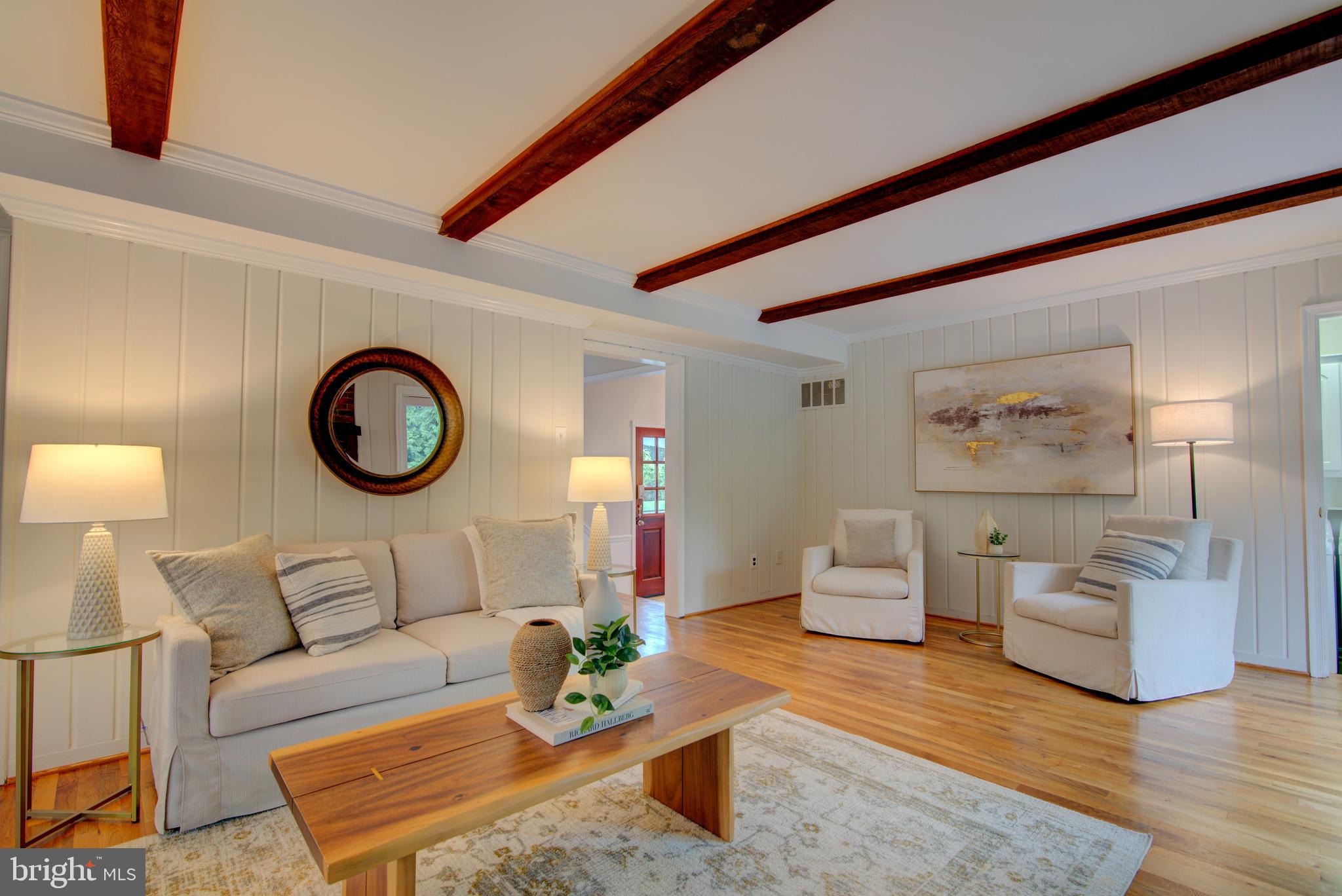 10405 Trumpeter Court Vienna, VA 22182 - Photo 11 of 43 a living room with furniture and a wooden floor