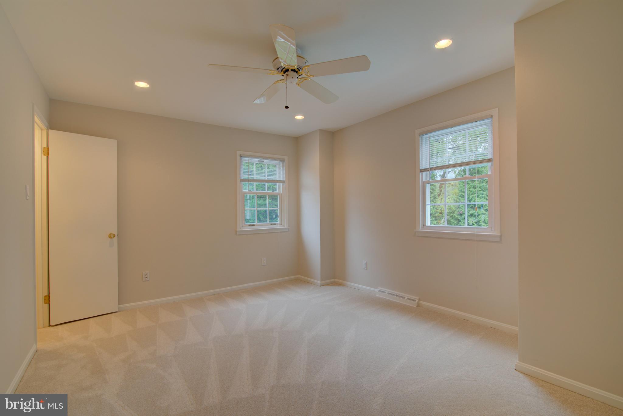 10405 Trumpeter Court Vienna, VA 22182 - Photo 24 of 43 a view of an empty room with a window