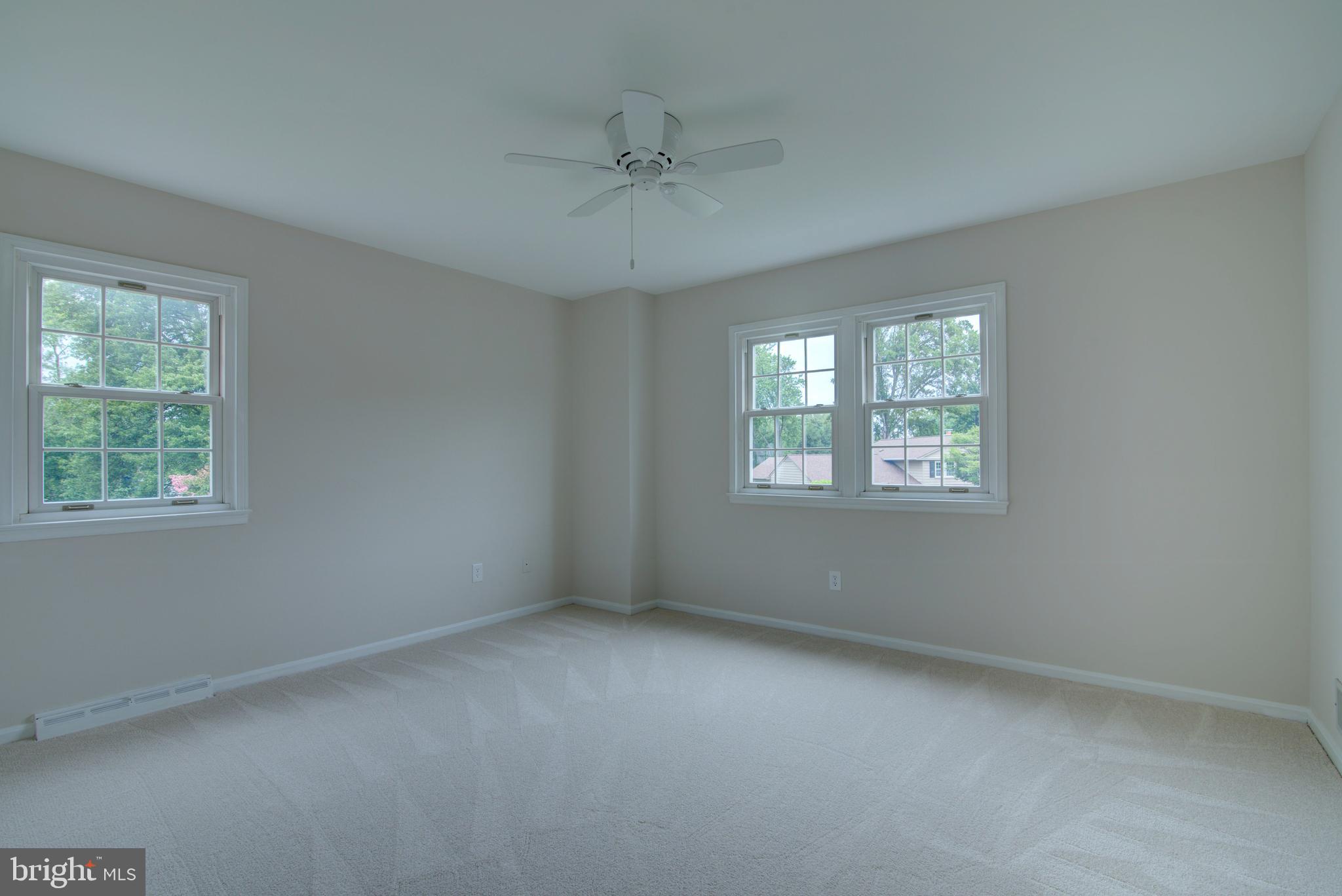 10405 Trumpeter Court Vienna, VA 22182 - Photo 26 of 43 an empty room with a window