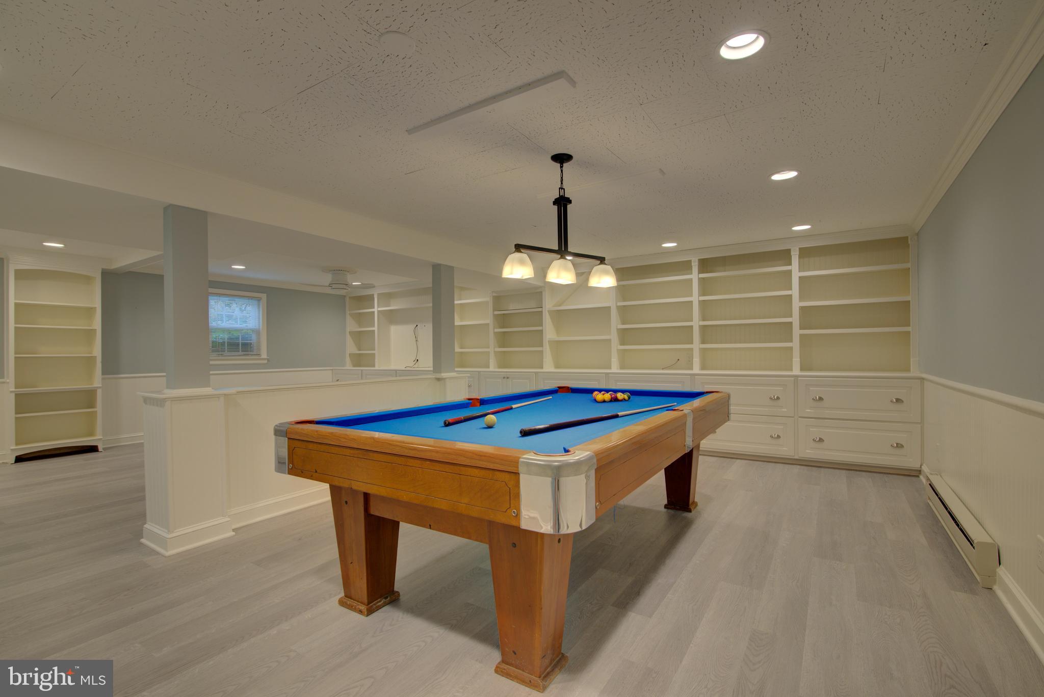 10405 Trumpeter Court Vienna, VA 22182 - Photo 29 of 43 a kitchen that has a lot of cabinets