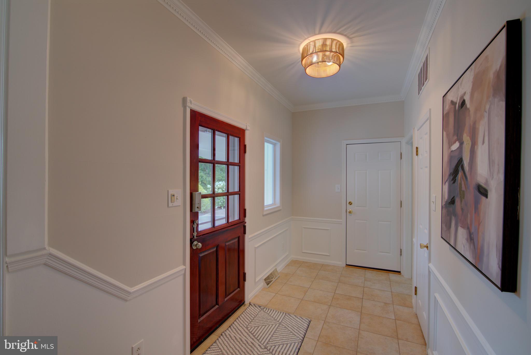 10405 Trumpeter Court Vienna, VA 22182 - Photo 3 of 43 a view of an entryway with kitchen