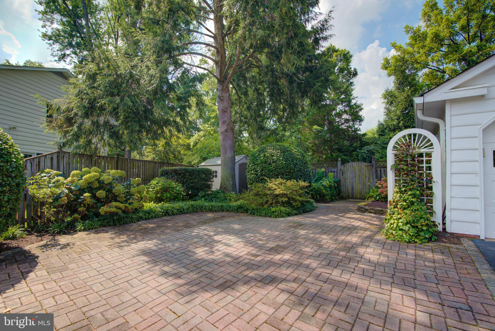 10405 Trumpeter Court Vienna, VA 22182 - Photo 42 of 43 a view of a garden with pathway