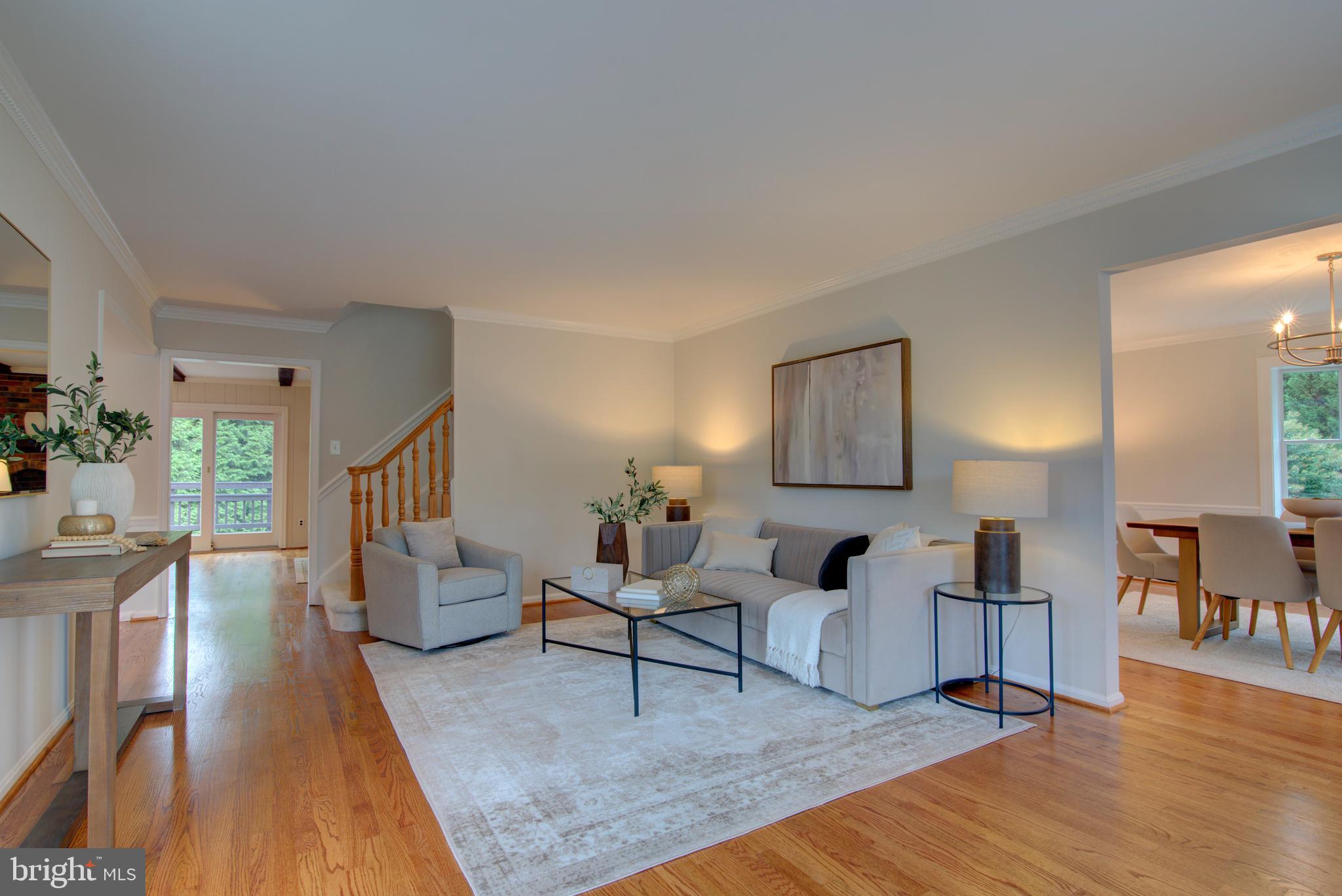 10405 Trumpeter Court Vienna, VA 22182 - Photo 5 of 43 a living room with furniture and a wooden floor