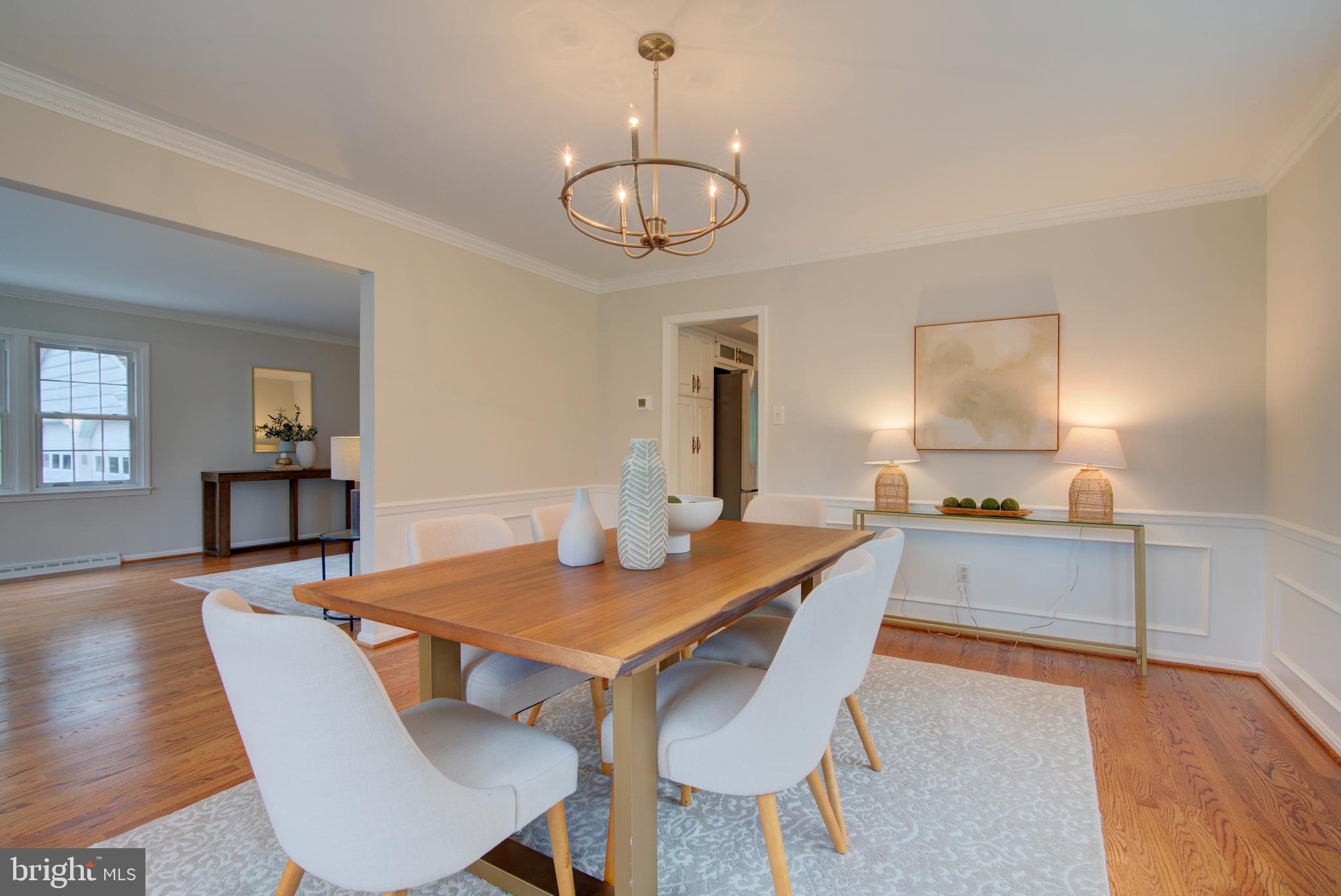 10405 Trumpeter Court Vienna, VA 22182 - Photo 8 of 43 a view of a dining room with furniture and wooden floor