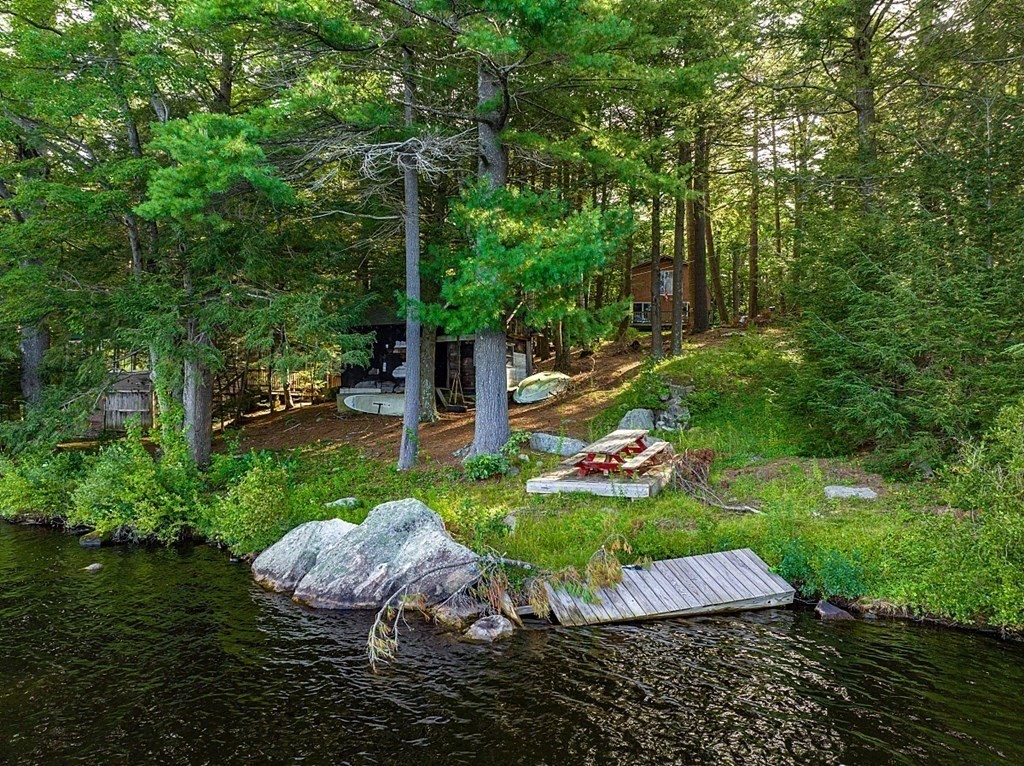 15 Browns Lake Road Ashburnham, MA 01430 - Photo 12 of 18 a view of a backyard with plants and a garden