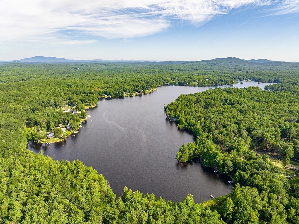 15 Browns Lake Road Ashburnham, MA 01430 - Photo 16 of 18 a view of a lake with a mountain in the background