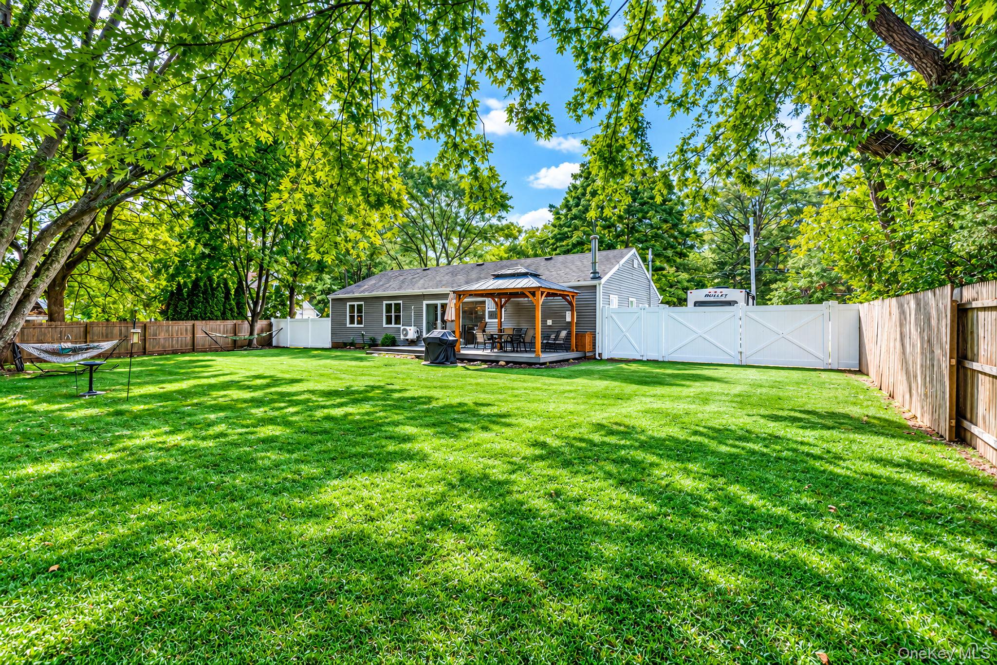 105 Raynor Road Ridge, NY 11961 - Photo 4 of 27 view from back of garden