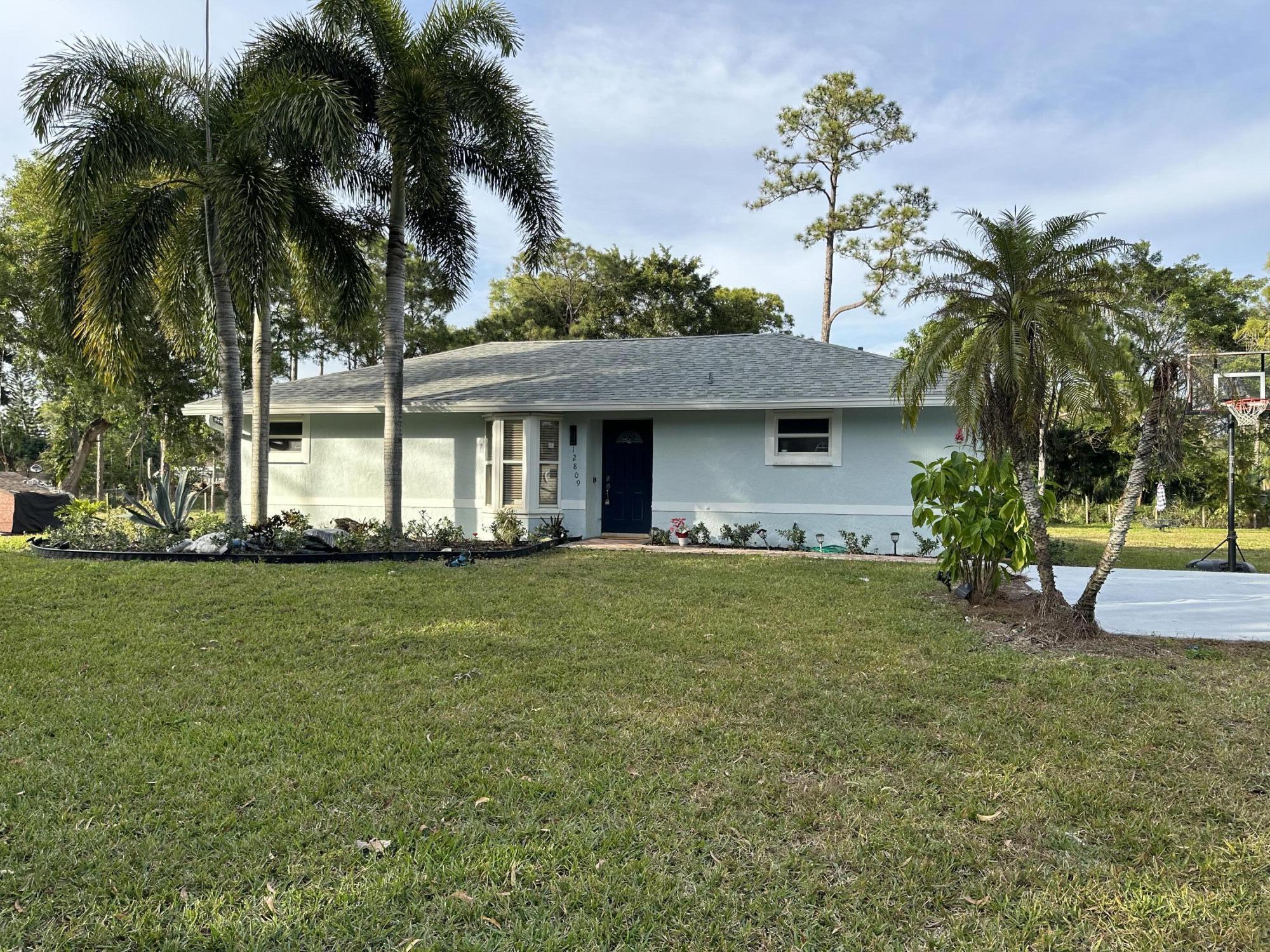 12809 53rd Road North Royal Palm Beach, FL 33411 - Photo 2 of 22 Front