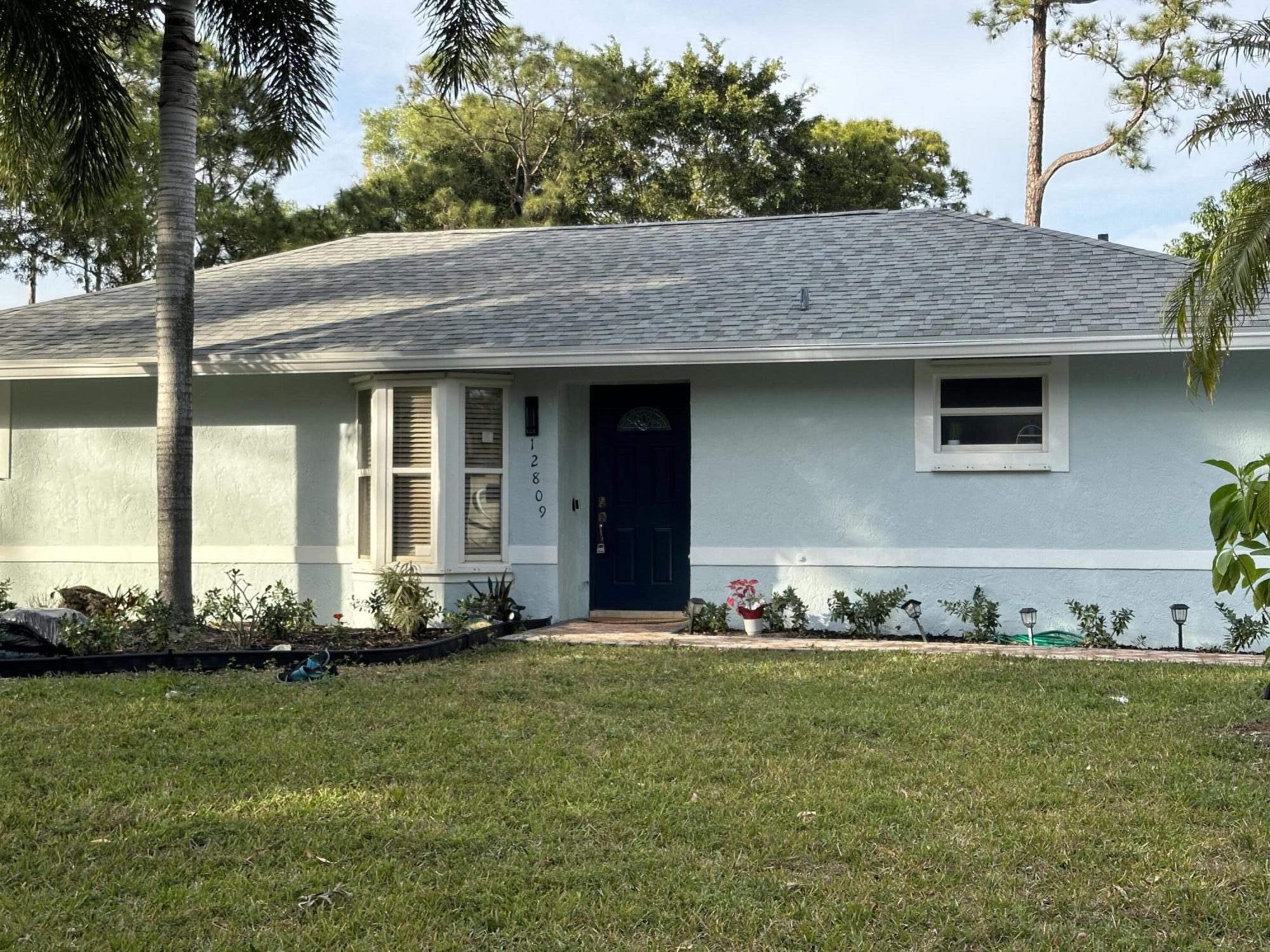 12809 53rd Road North Royal Palm Beach, FL 33411 - Photo 3 of 22 Front