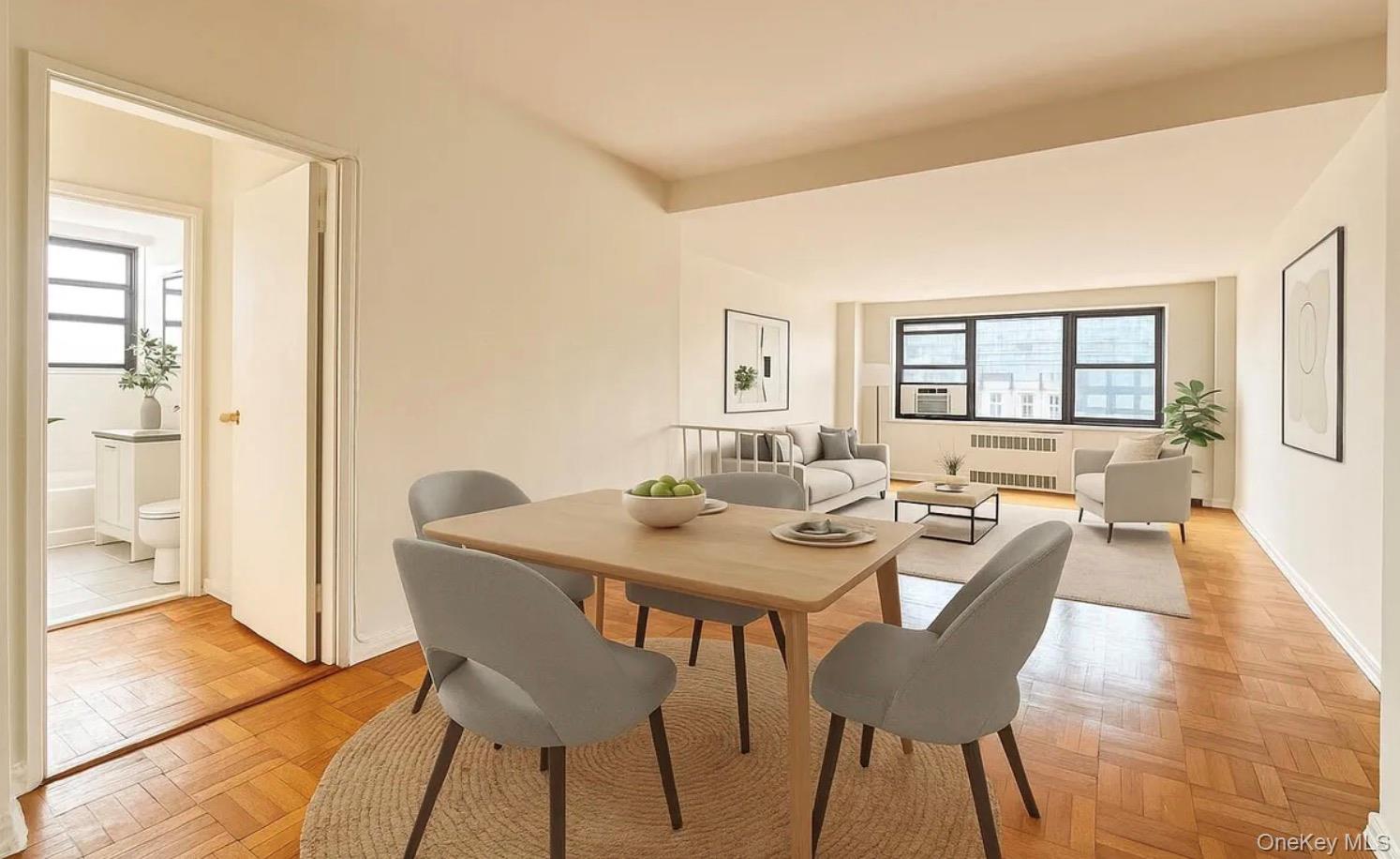 98-22 63rd Drive, Unit 7B Queens, NY 11374 - Photo 2 of 10 a view of a dining room with furniture and wooden floor