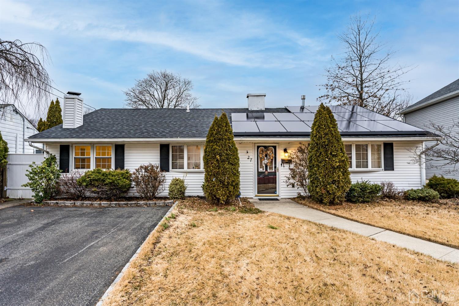 27 Fairfax Road Edison, NJ 08817 - Photo 1 of 25 a front view of a house with a yard