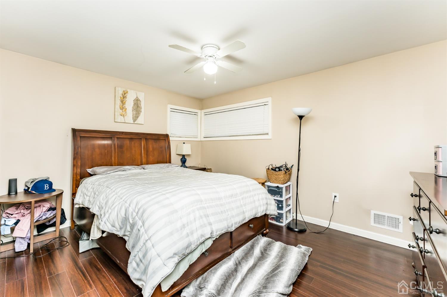 27 Fairfax Road Edison, NJ 08817 - Photo 14 of 25 a bedroom with a bed and wooden floor