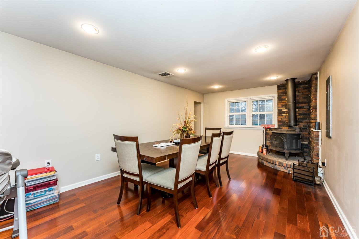 27 Fairfax Road Edison, NJ 08817 - Photo 6 of 25 a view of a dining room with furniture and wooden floor