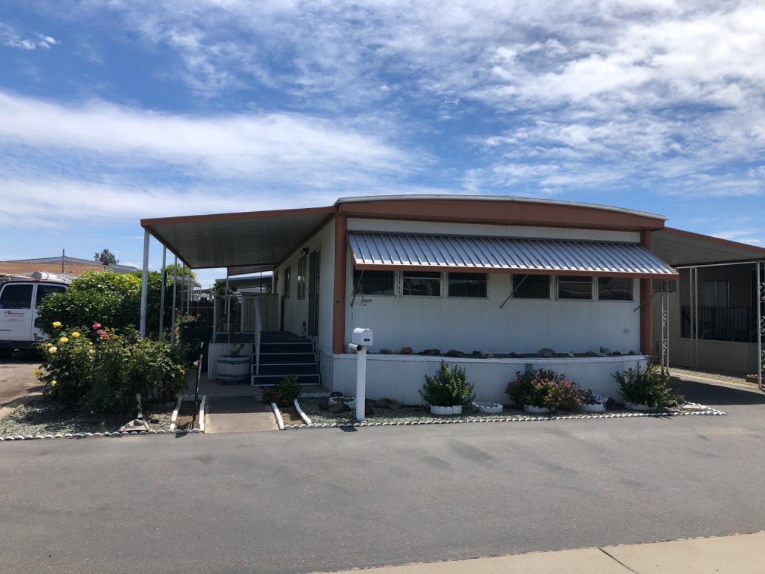 4125 Mchenry Avenue, Unit 35 Modesto, CA 95356 - Photo 1 of 20 front view of a house with a street