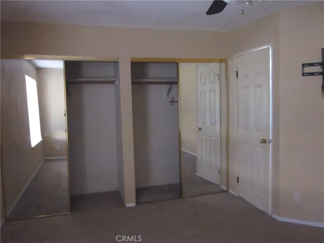 a bathroom with a shower and toilet