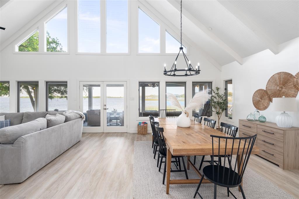 1907 Buck Run Graford, TX 76449 - Photo 3 of 33 a view of a dining room with furniture wooden floor and chandelier