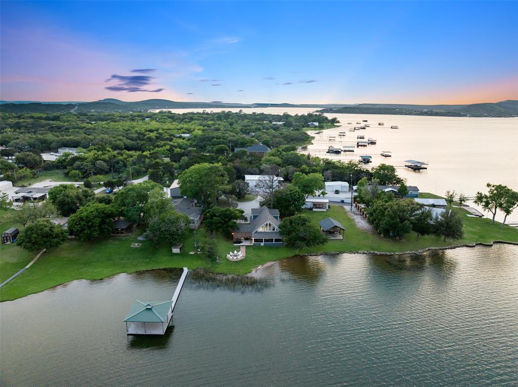 1907 Buck Run Graford, TX 76449 - Photo 32 of 33 an aerial view of a houses with outdoor space and lake view
