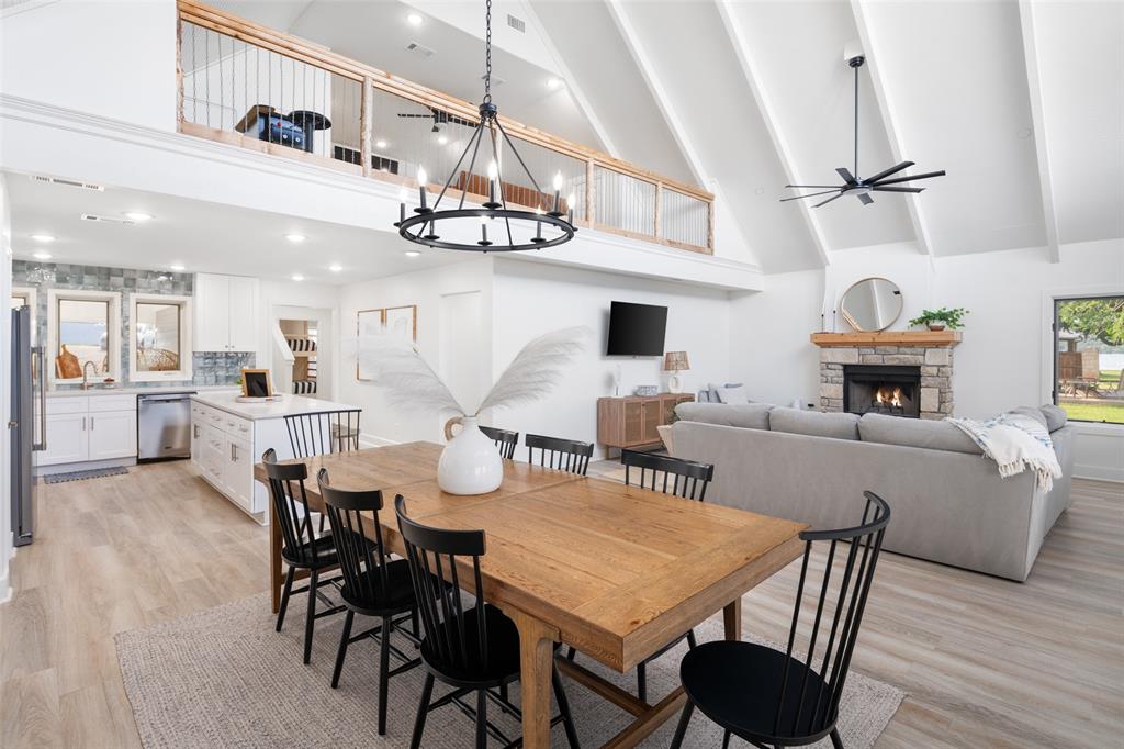 1907 Buck Run Graford, TX 76449 - Photo 10 of 33 a view of a dining room with furniture and wooden floor