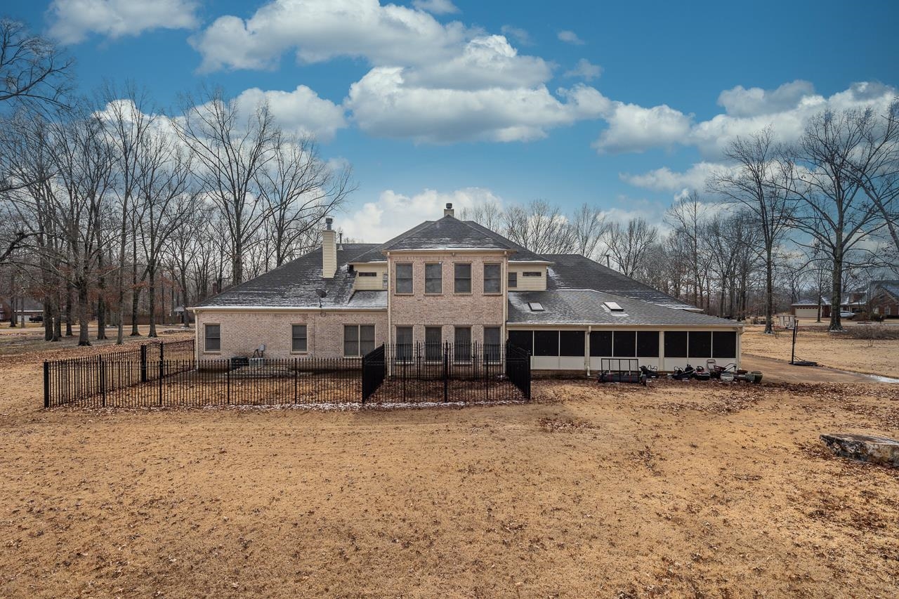 9530 Mayfield Road South Collierville, TN 38017 - Photo 23 of 25 The backyard includes a fenced area for pets.
