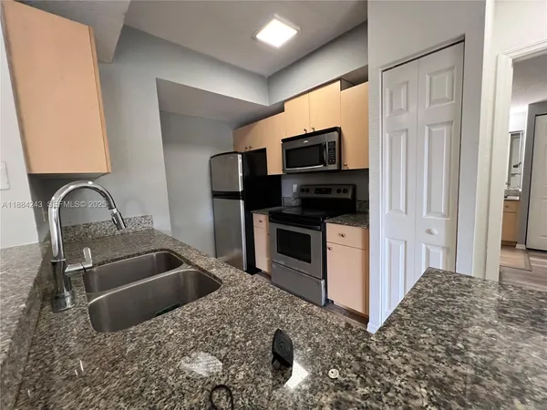 $262,500 | 2400 Centergate Drive, Unit 102, Miramar, FL 33025