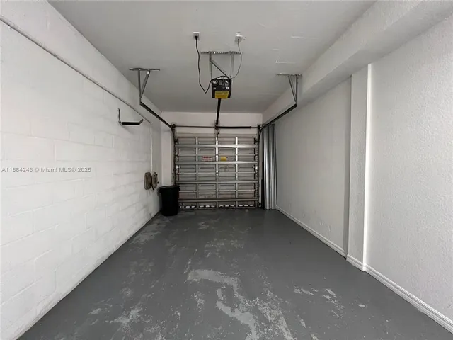 a view of room with stairs and a window