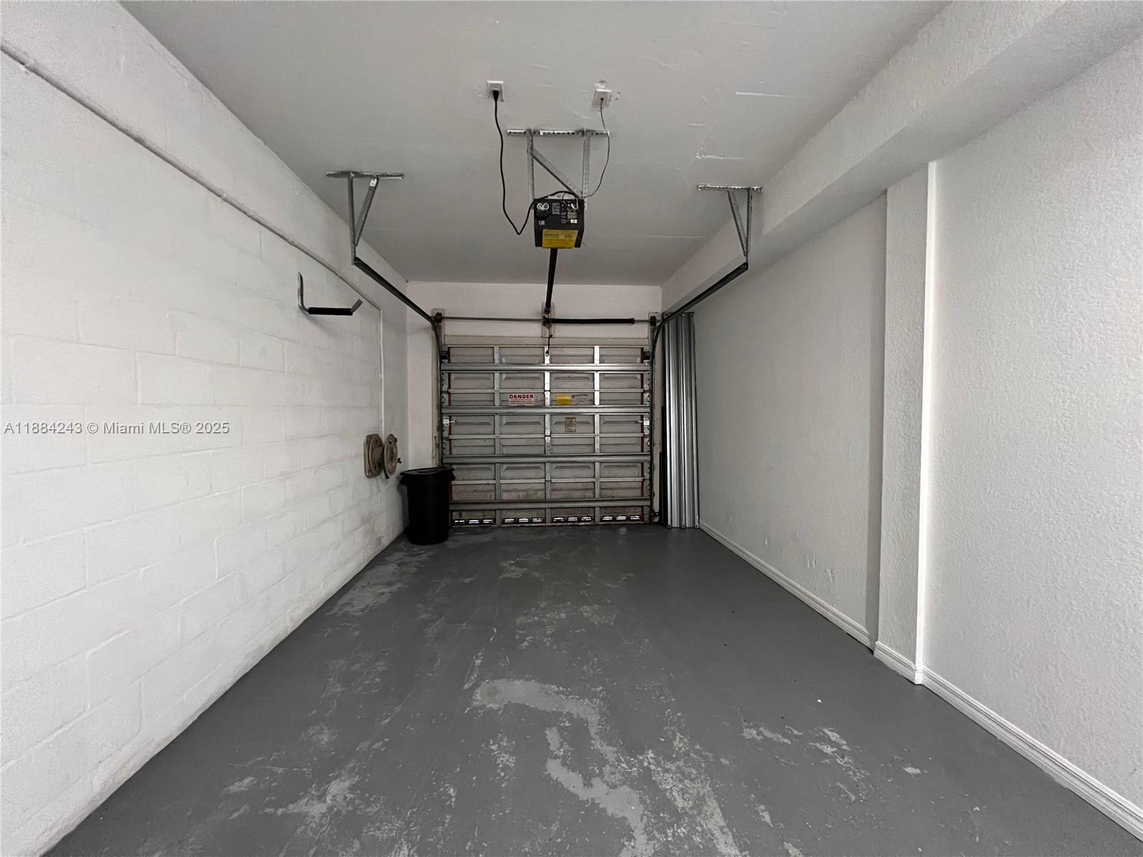 2400 Centergate Drive, Unit 102 Miramar, FL 33025 - Photo 10 of 12 a view of room with stairs and a window